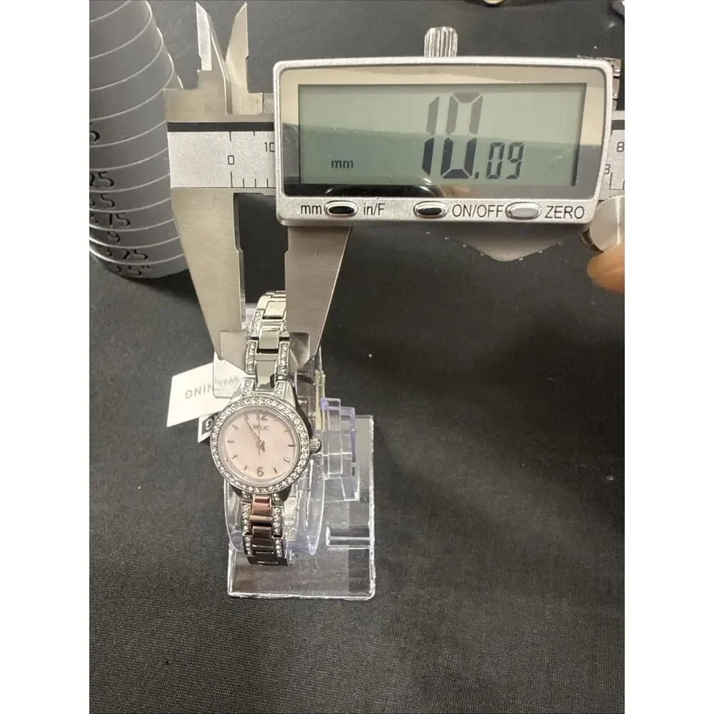 NEW RELIC BY FOSSIL ZR-34571 RUNNING PERFECTLY WITH TAGS STILL ON IT!! (B10)